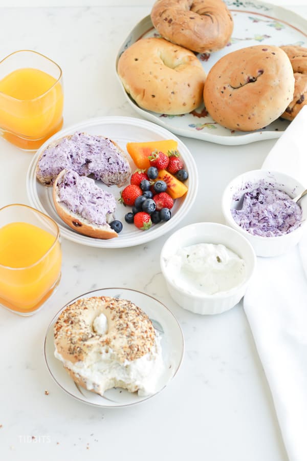 Skyr Cream Cheese in ramekins and spread on bagels on a breakfast table