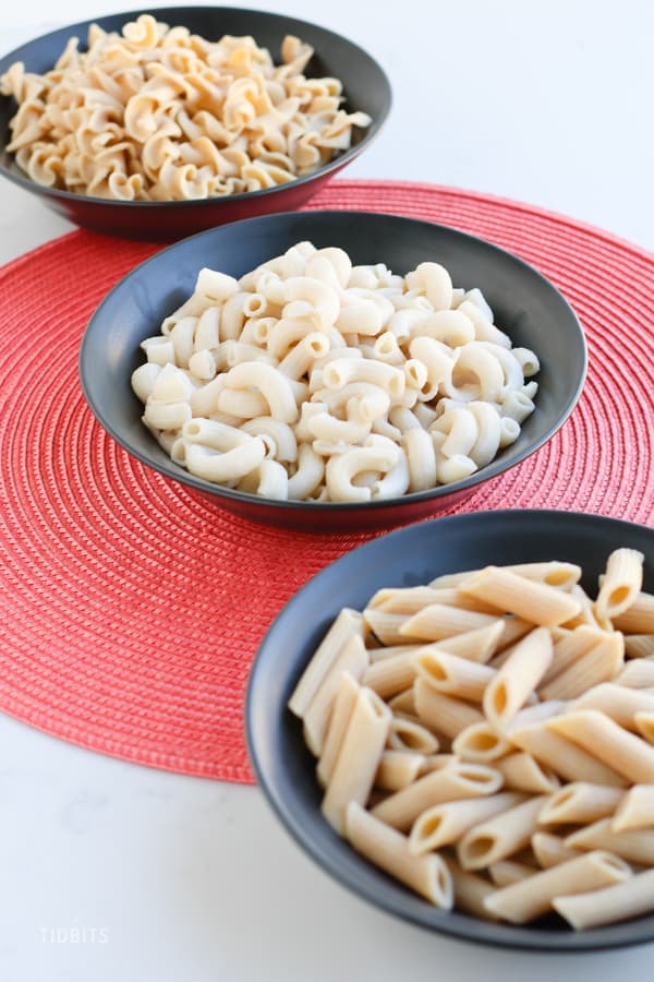 Bowls of instant pot pasta on a work surface - TIDBITS Marci