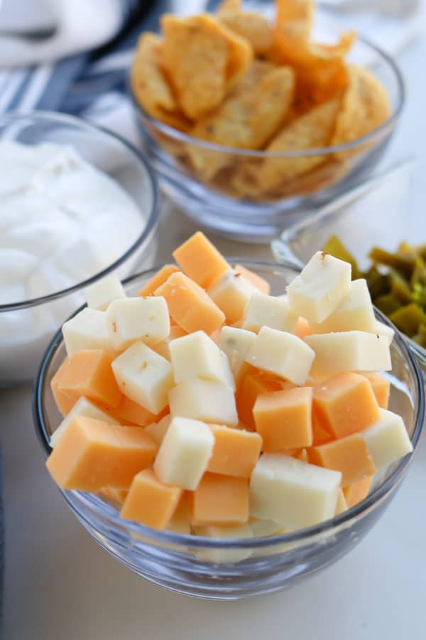 Cubes of cheddar and pepperjack cheese in a bowl
