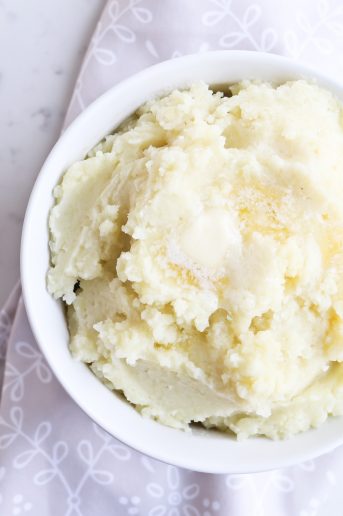 Pressure Cooker Mashed Potatoes in a white bowl