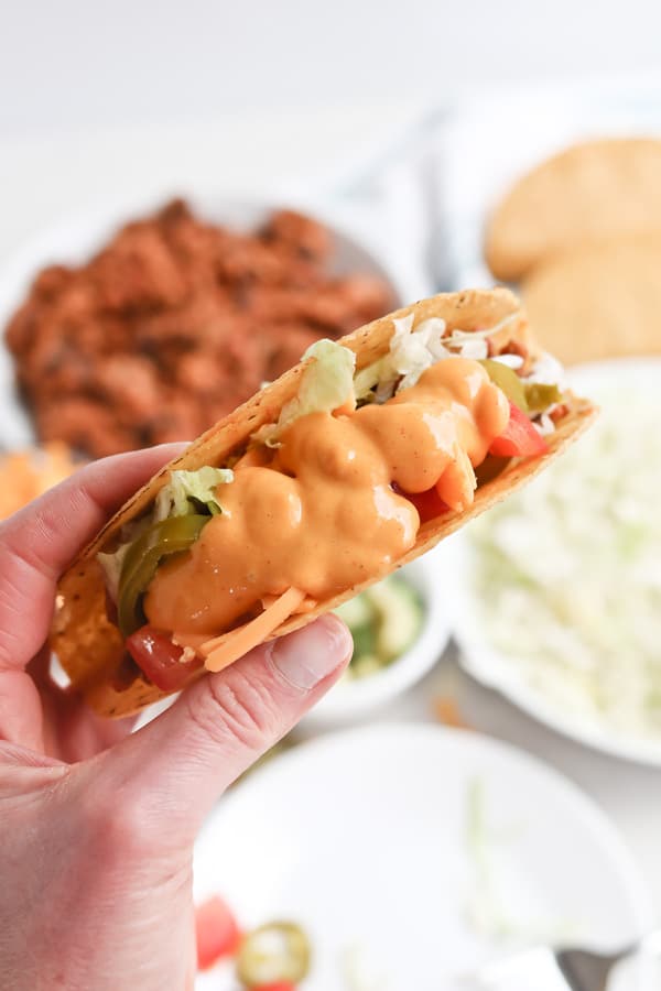 Taco with cheese sauce andPressure Cooker Instant Pot Healthy Meat and Bean Taco Filling 