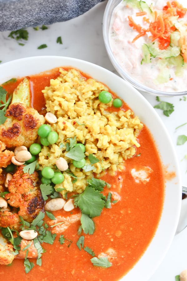 instant pot tikka masala in a bowl with toppings