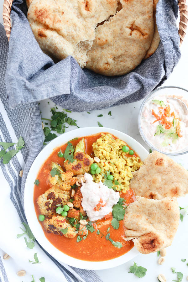 instant pot tikka masala in a bowl with toppings