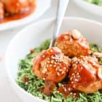 Instant Pot Kung Pao Meathballs in a bowl with green rice