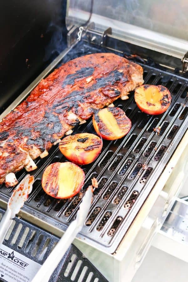 Instant Pot Chipotle Peach BBQ Ribs on a grill