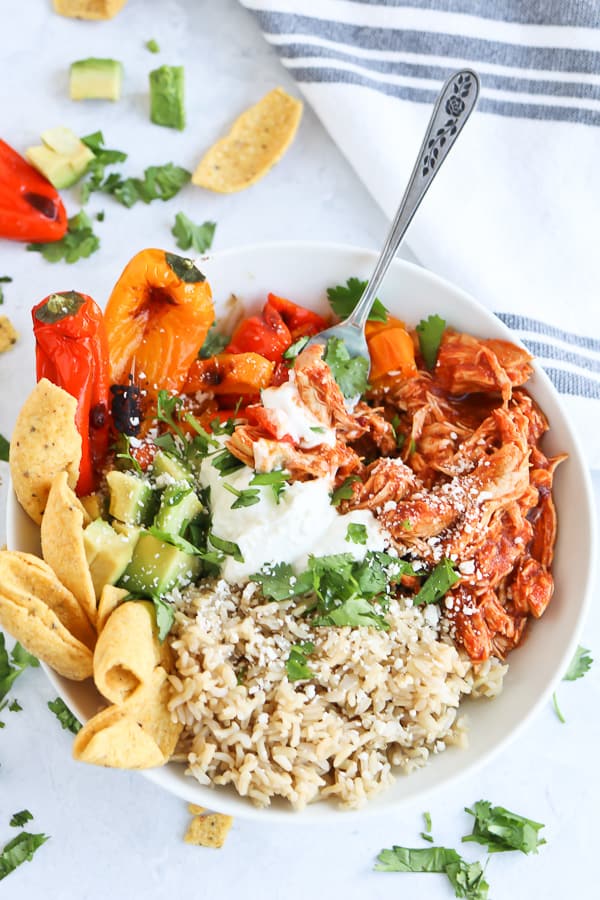 Chipotle Chicken in a white bowl with rice and vegetables
