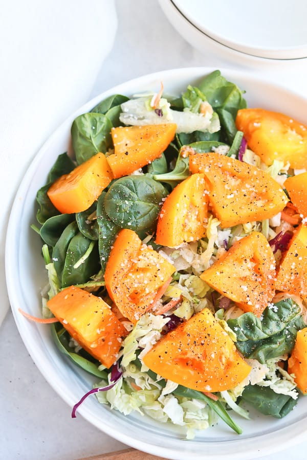 Yellow tomato and spinach salad