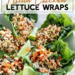 Instant Pot Asian Chicken Lettuce Wraps on a white plate with limes