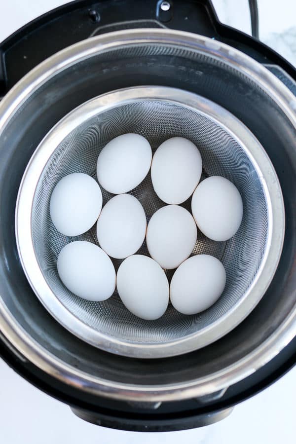 hard boiled eggs in a basket in the pressure cooker