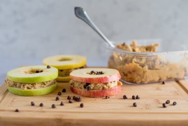 Slices of apples filled with healthy cookie dough