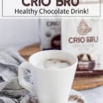 crio bru in a white cup with cream