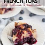 Stuffed French Toast on a white plate covered in blueberry sauce