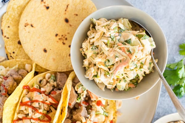 Corn tortillas with pork and coleslaw