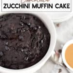 chocolate zucchini cake in a white dish with chocolate chips on top