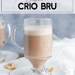 glass of crio bru with cashews on a napkin