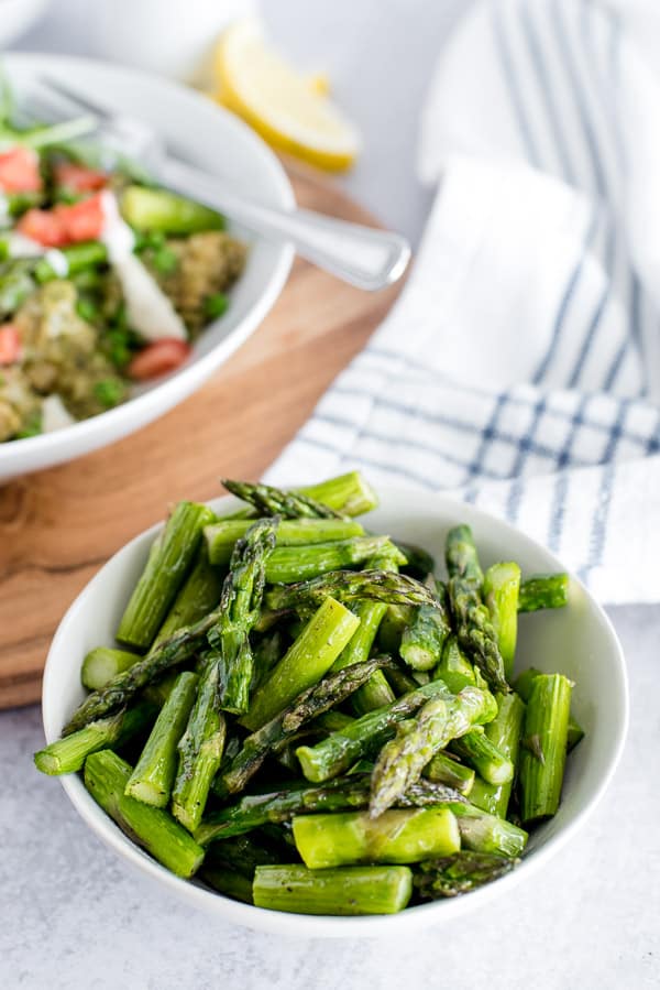 Bowl of asparagus in a white bowl