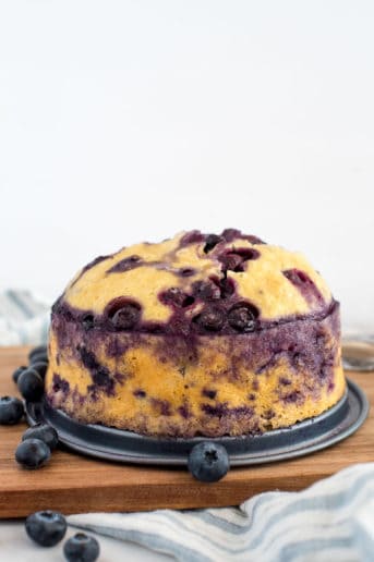 blueberry breakfast cake on a cutting board