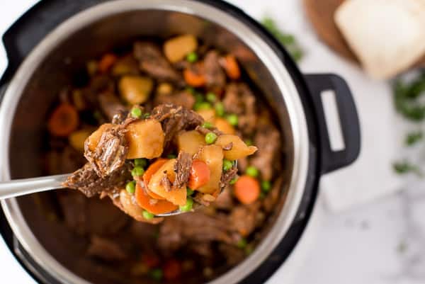 Beef stew with carrots, peas and onions in an Instant Pot
