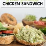 open faced chicken with green sauce on a bagel with tomato and spinach