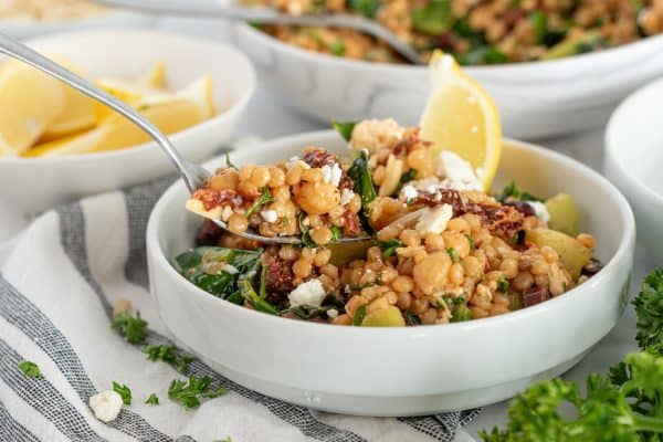 Greek Couscous Salad with lemon, spinach, and feta cheese.